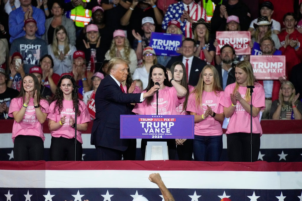 Trump invites 'brave' women's swim team that 'stood up to' transgender athlete to rally stage